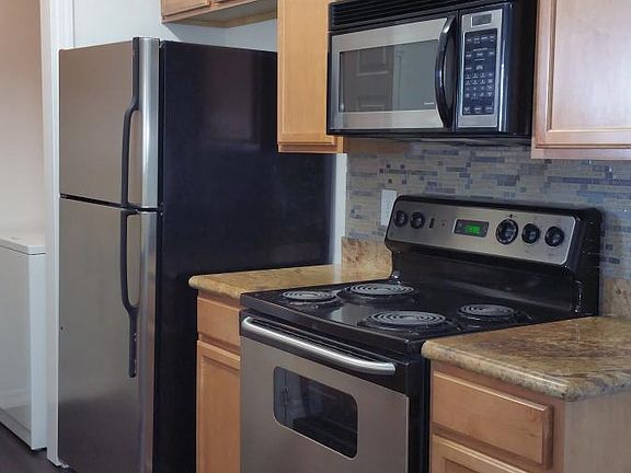 Modern kitchen with stainless steel appliances