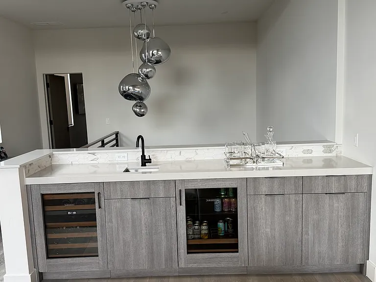 Wet bar complete with Subzero Wine and Beverage refrigerators.