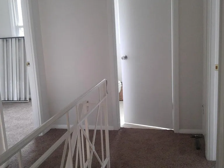 Upstairs hall to main bath and master suite