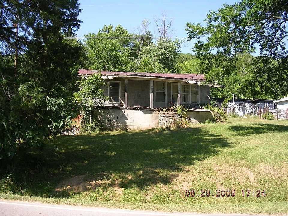 a really ugly house with old oak framing