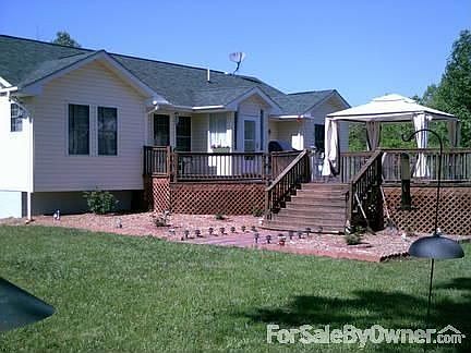 Deck surrounded by rose gardens