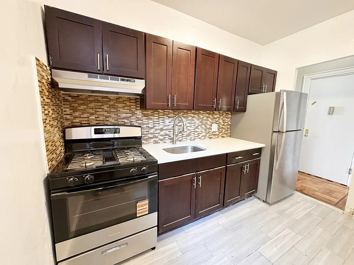 Building Photo - 8630 23rd Ave #1F