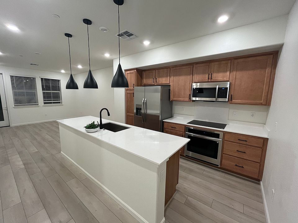 Kitchen with open living and dining room