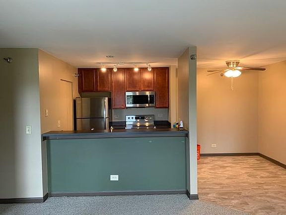 View of Kitchen; Counter & Dining room from Living Room