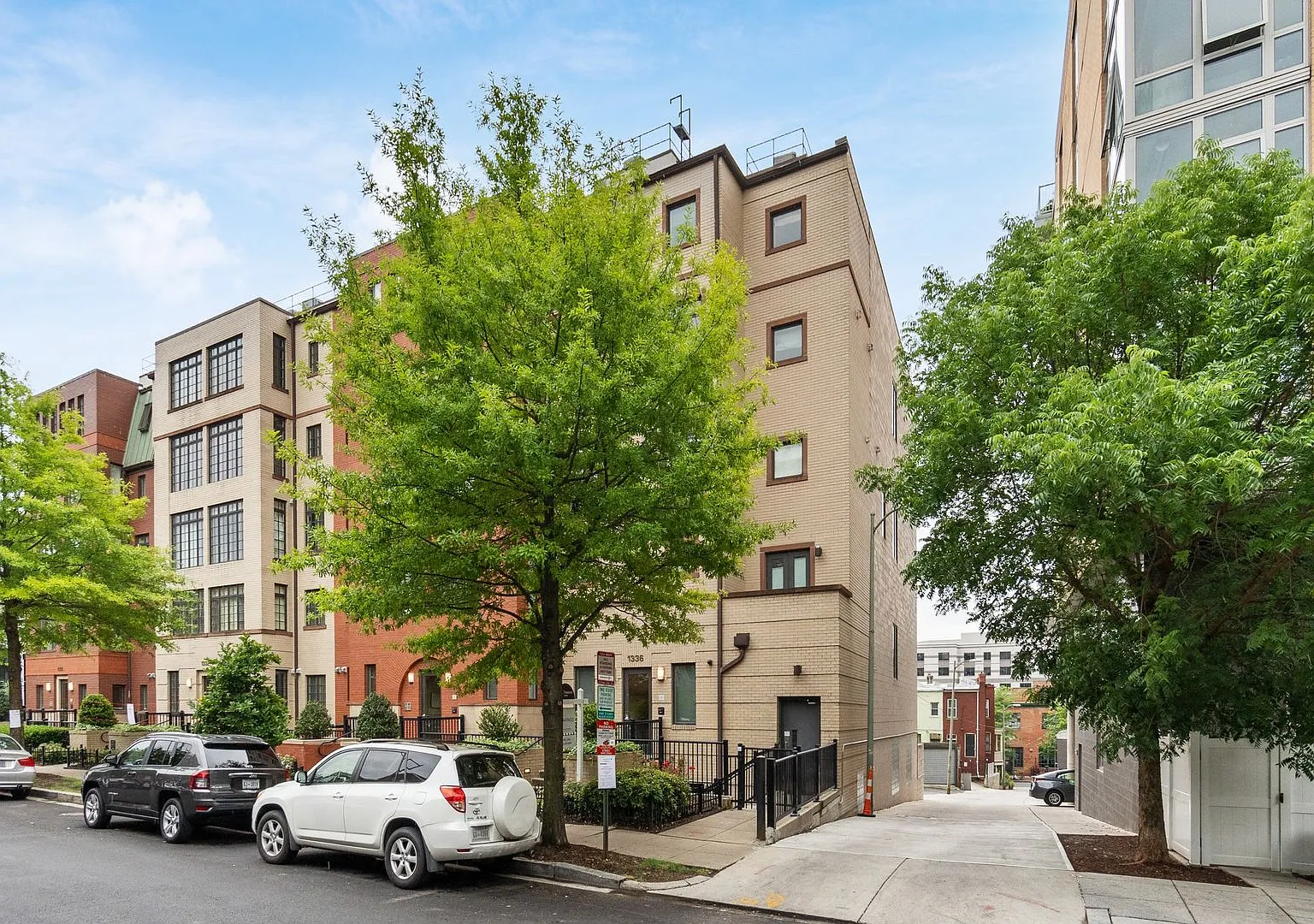 U St Corridor Stunning 1BR+Den Corner Condo w/City Views & Parking Available — Photo 2