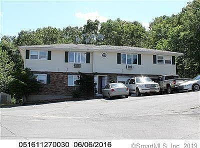 Front of the complex. Your unit is on the upper left side. 2nd Floor. The trees are coming back but not as big.