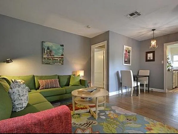 Living room and dining space as they were previously styled.