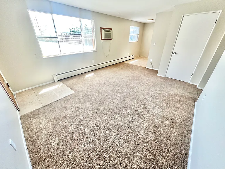 Experience the warmth and comfort of your new living room, filled with natural light. Experience the warmth and comfort of your new living room, filled with natural light.