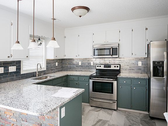 Custom bar, built-in USB outlets, beautiful 12 x 24 porcelain tile