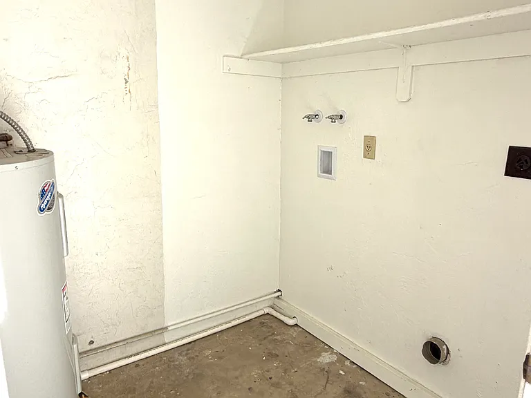 Washer and dryer hookups. Storage and water heater