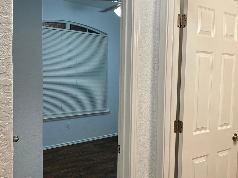 Hallway to bedroom One