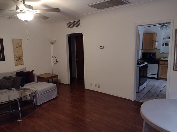 Living room doors to kitchen and rest of house