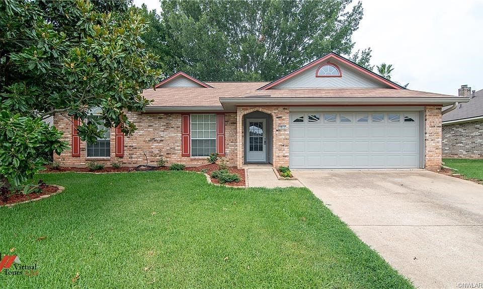 New landscaping and new paint welcome you to 4912 General Rusk Drive in South Bossier.