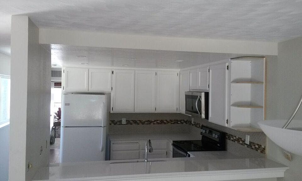 Newer Appliances, counters, backspash, cabinet doors