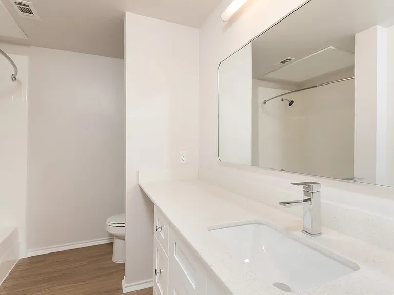 Bathroom with hard surface flooring