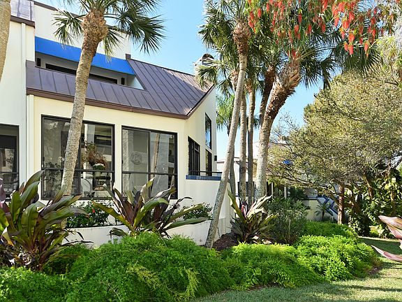 Side entrance leads to pool