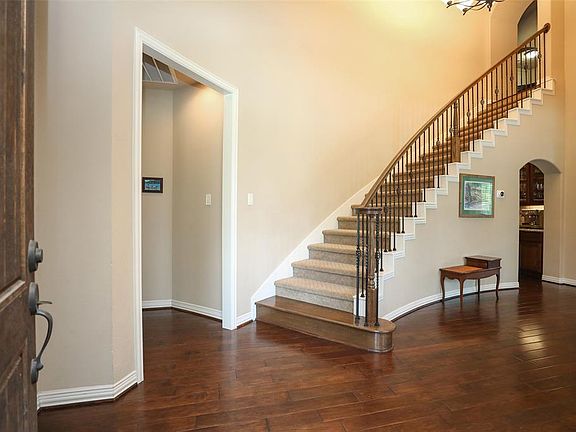 Gleaming hardwoods greet you on arrival.