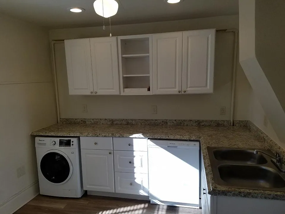 New washer/dryer, dishwasher, all new cabinets, stainless steel sink with disposal. New counter top.
