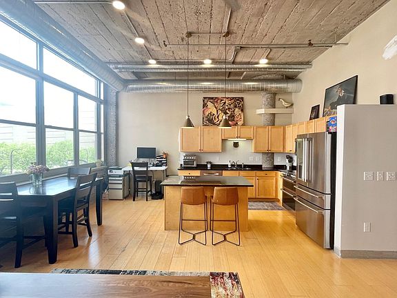 Spacious kitchen with maple cabinets. Plenty of space to add your favorite desk.