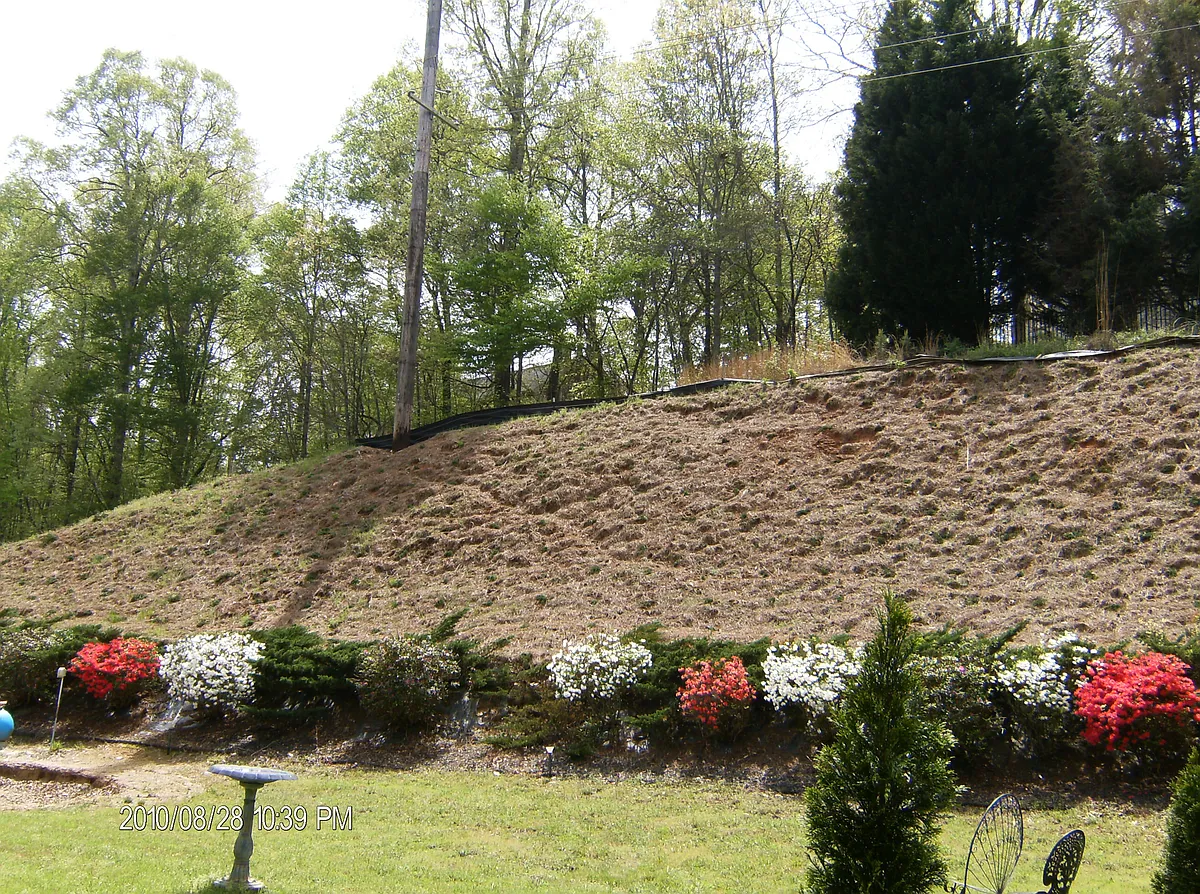 Rental faces a hill, a deer haven, and garden area below. Springs brings spectacular in abundant azeleas. - 1801 Mitzi Ct