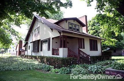 Front entrance of home
						:
						Double lot and just 2 blocks from the elementary and middle schools.