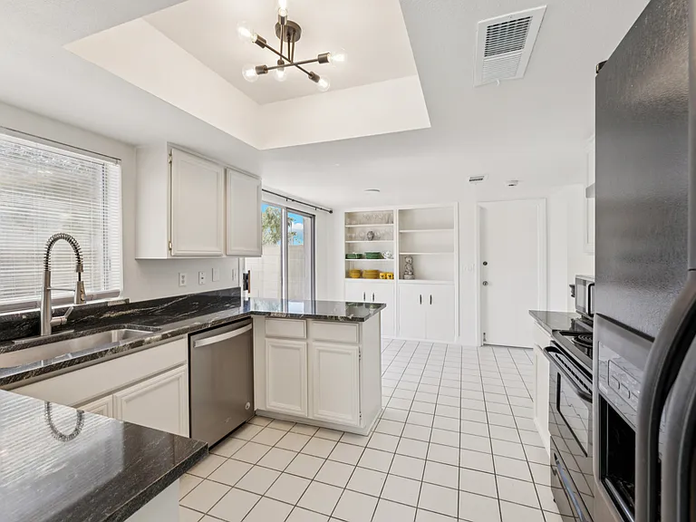 7736 E Buena Terra Way — Photo 3