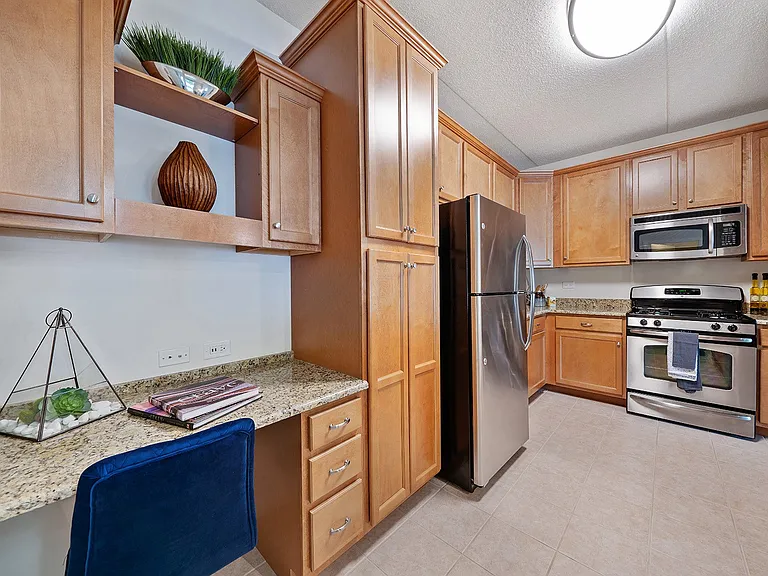 Wood-accent kitchen with stainless steel appliances