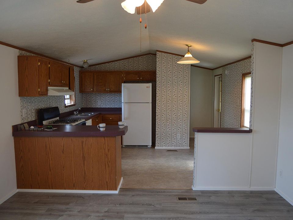 Living room looking into kitchen
