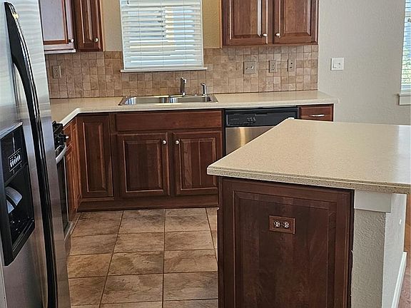 4th image of 10333 E 26th Avenue