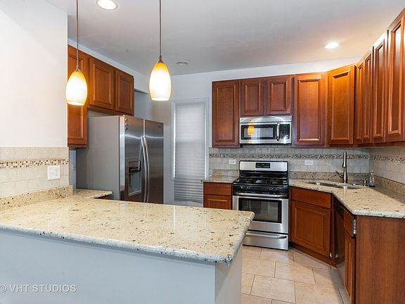 5th image of 6209 W Cornelia Ave