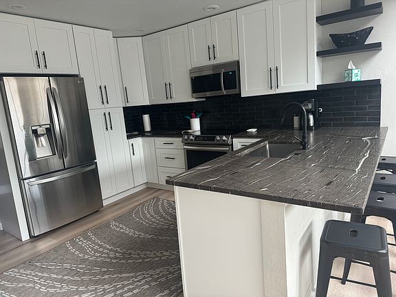 Main level kitchen all new cabinets and appliances.