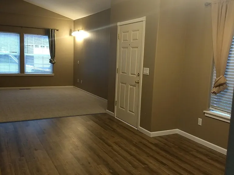 Front entrance, dining room, and living room.