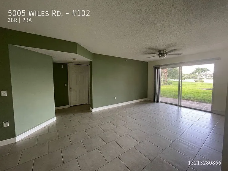 5005 Wiles Rd #102 — Photo 1
