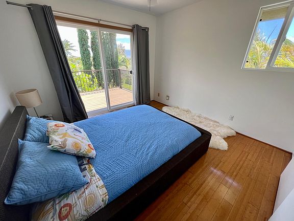 upstairs bedroom with queen