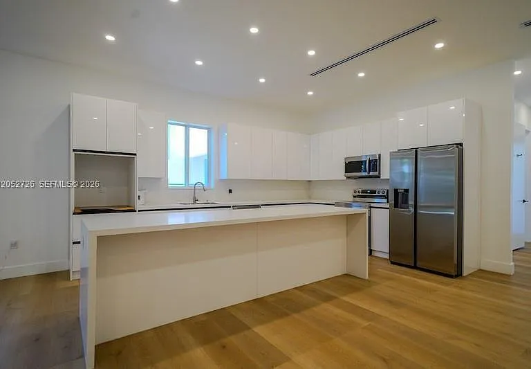 112 NW 24th Ct — Photo 12