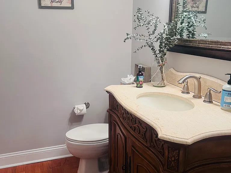 1/2 bath off living room and kitchen