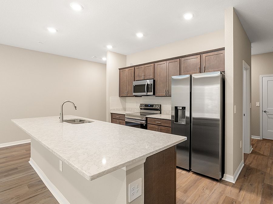 Brand-new open layout townhome for sale in St. Cloud, FL, with 3 bedrooms plus a loft!
