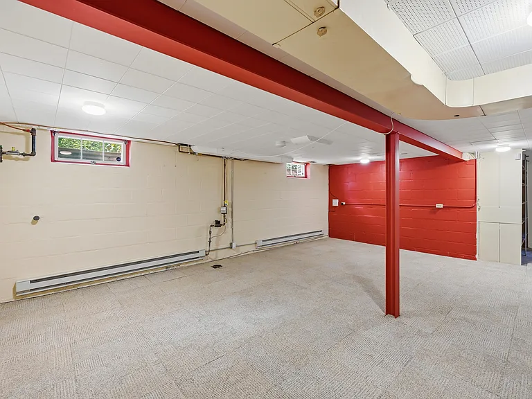 Large, partially finished basement for exercise/rec room. Mechanicals, storage and laundry down here as well.