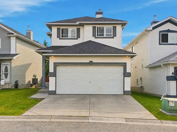 113 N Rocky Ridge Point NW, Calgary, AB T3G 4R5