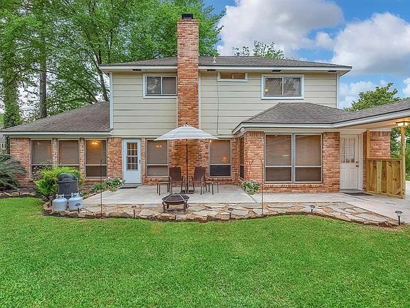 Extended flagstone patio offers plenty of room for outdoor entertaining, grilling, and gathering of friends and family. Home is constructed of fiber cement siding, brick and stucco. Roof installed in 2015, AC in 2020, and Furnace in 2015.
