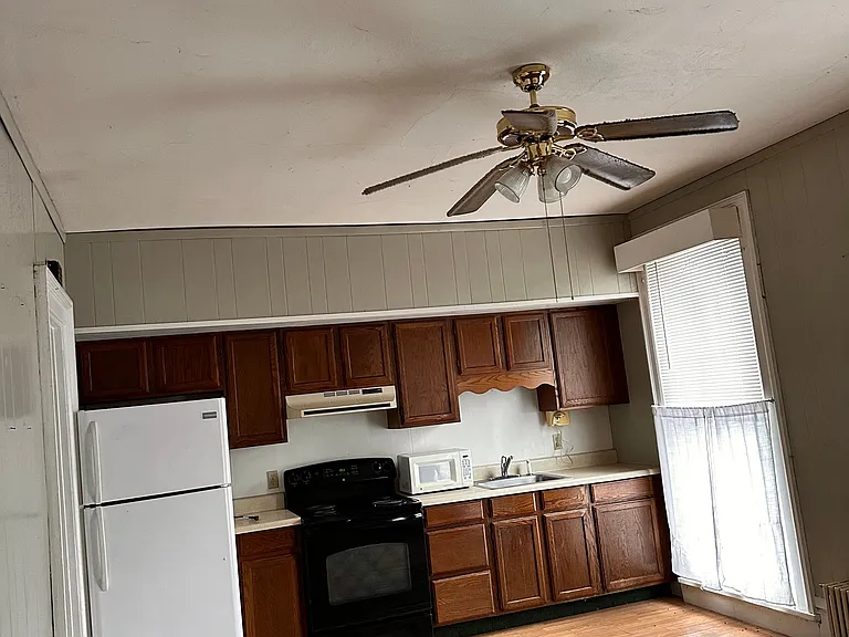 Large open kitchen & dining/living room space.