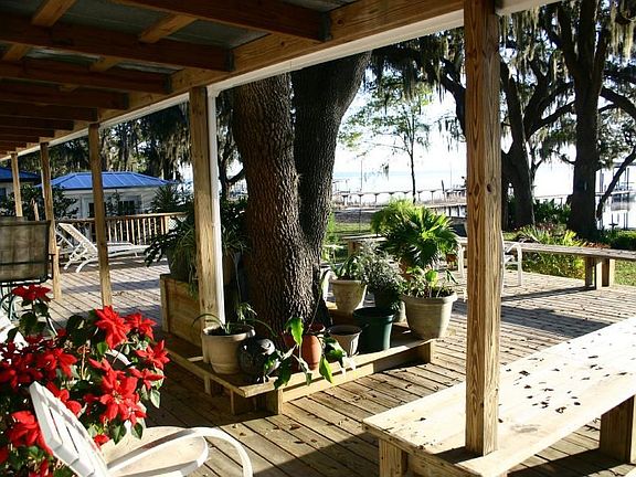 Large (24’x48’) riverside deck e/w water, electric and hot tub