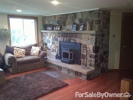Lower level family room
						:
						Walkout to back yard. Bedroom & bath, office, wet bar, 2 family & theater areas.