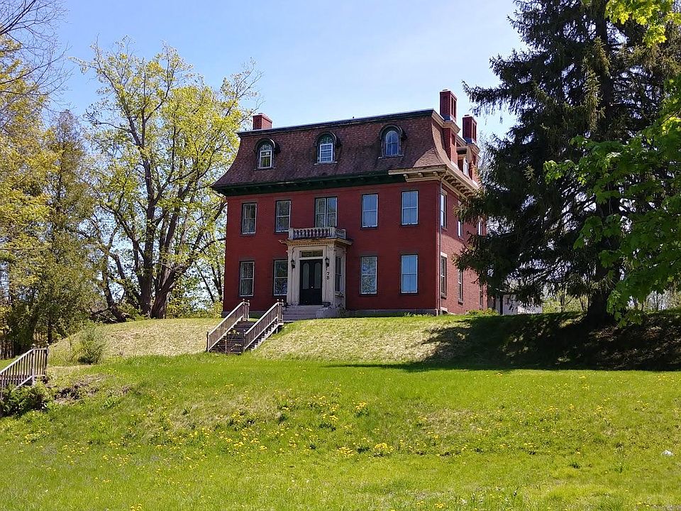 Looking up at the home from the street.