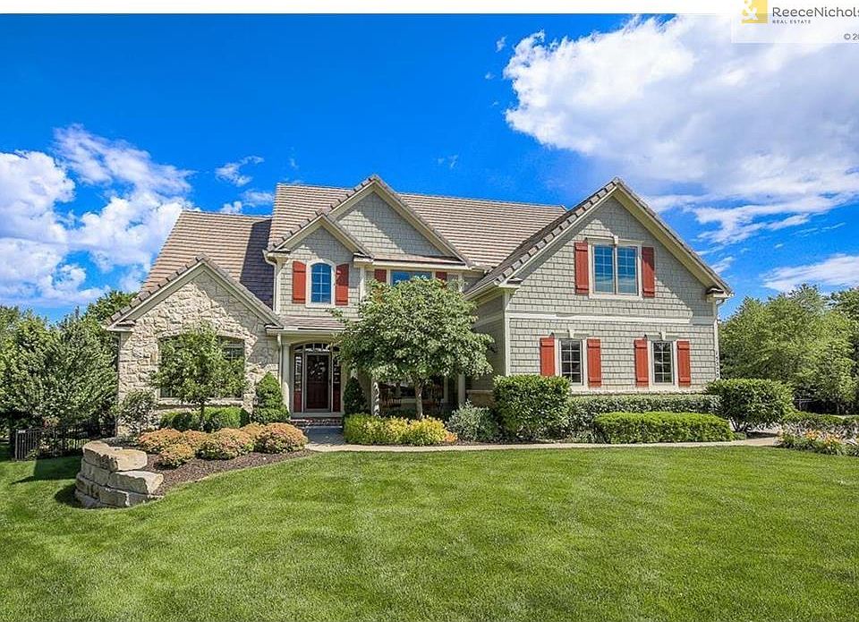 Beautiful curb appeal with lush landscape around perimeter of the property!