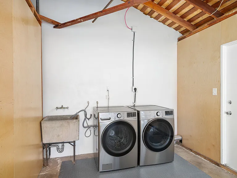 Fully equipped with a high-quality LG washer and dryer set for effortless, at-home laundry.