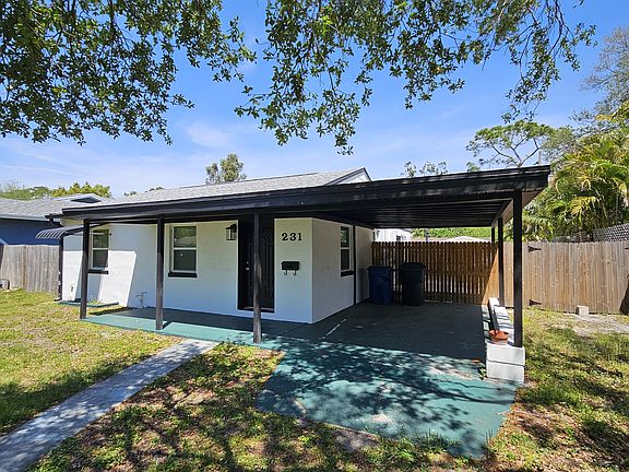Carport and Parking pad. Fenced in yard.