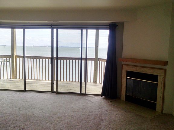 Living Room with Fireplace & Waterfront
