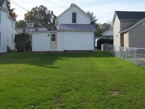 Large back yard with alley access for off-street parking or build garage.