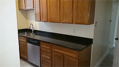High End Cabinets, Granite Counter-tops, Brand New Stainless Steel Dishwasher, Under-Mount Sink
